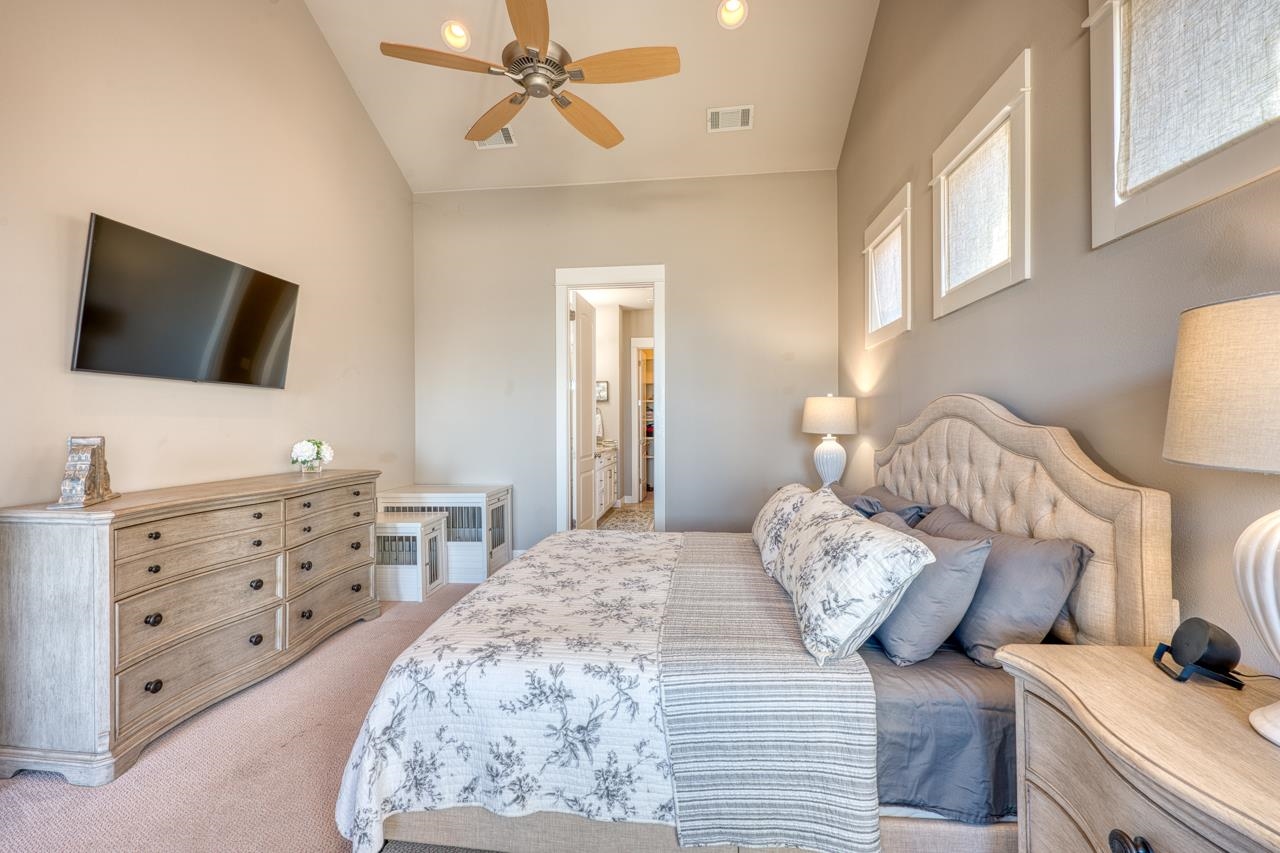 211 Chandler Way Kingsland, TX 78639 - Photo 12 of 40 a bedroom with a bed and a flat screen tv