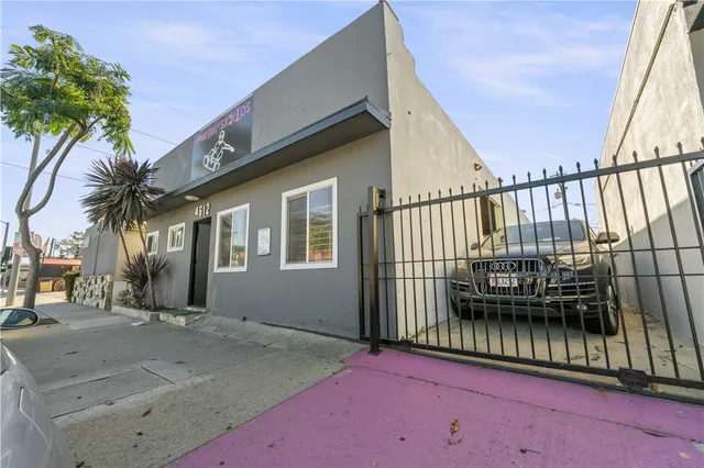 a utility room with lots of clutter and trees