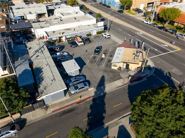 an aerial view of a house with outdoor space
