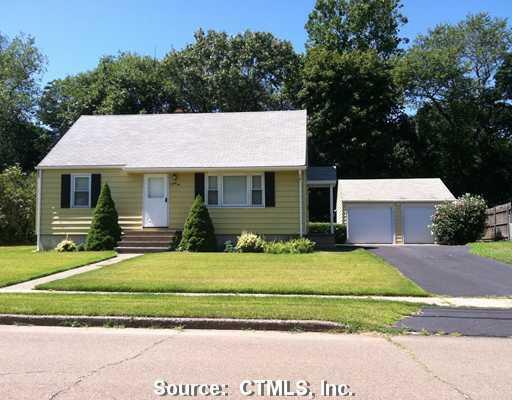 32 Beaverbrook Road Milford, CT 06461 - Photo 1 of 1 front view of a house with a patio