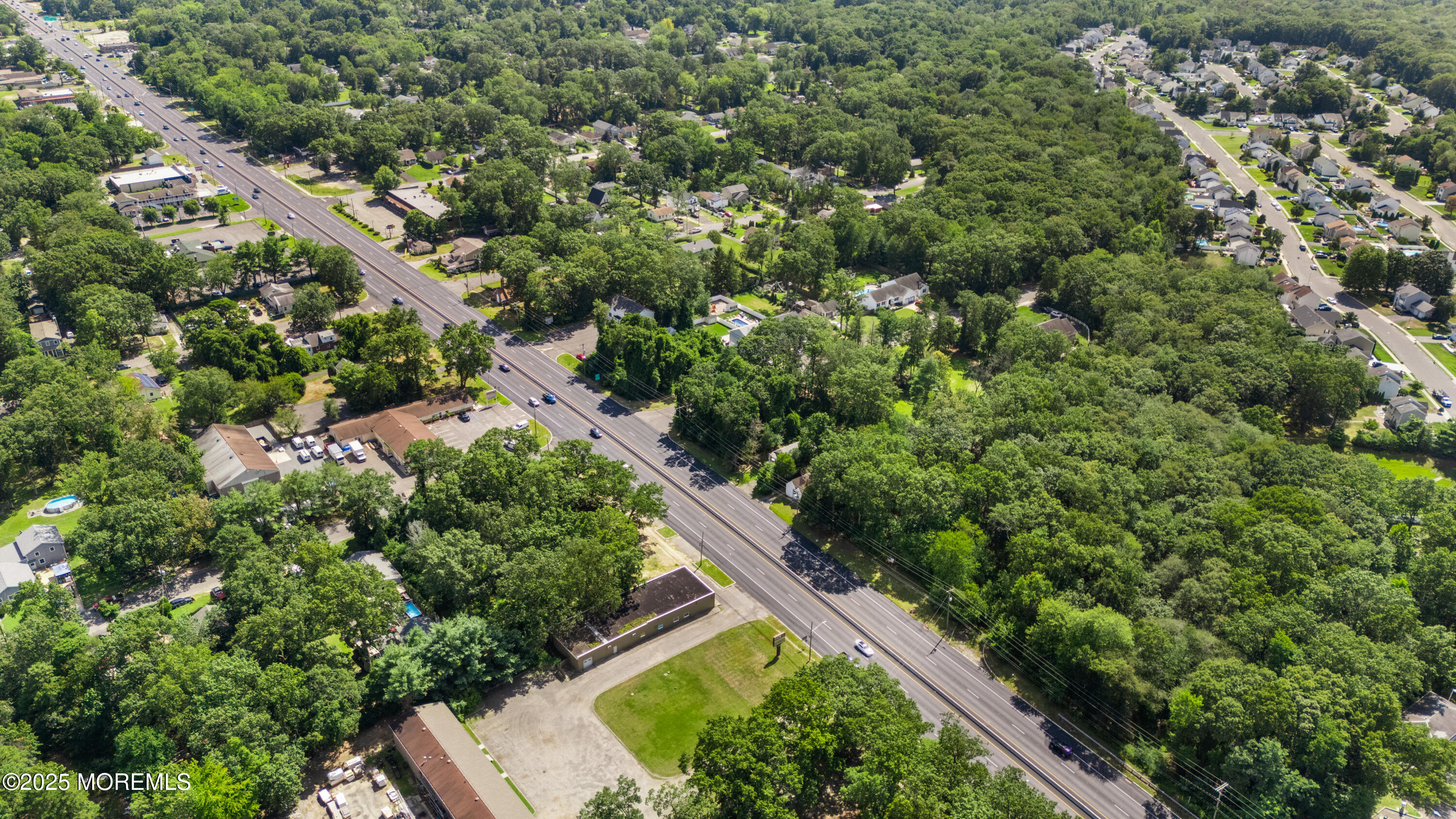 0 Route 9 Howell Nj 07731 Howell, NJ 07731 - Photo 13 of 13 an aerial view of residential house with outdoor space and trees all around