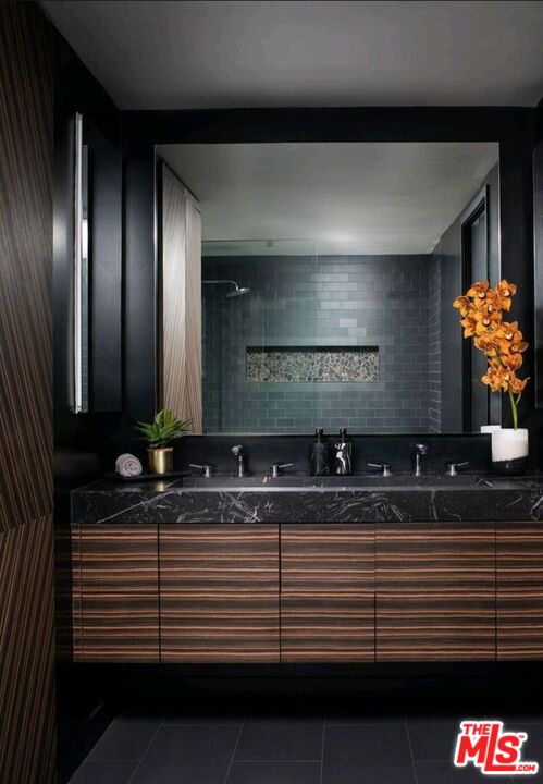 1755 Ocean Avenue, Unit 305 Santa Monica, CA 90401 - Photo 7 of 20 a bathroom with a sink and a mirror