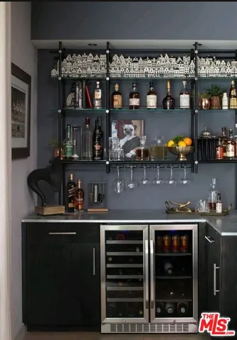 a kitchen with a stove and cabinets