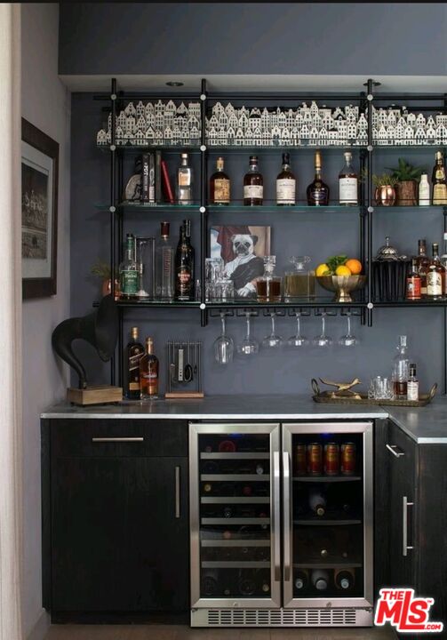 1755 Ocean Avenue, Unit 305 Santa Monica, CA 90401 - Photo 8 of 20 a kitchen with a stove and cabinets