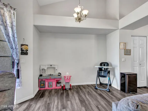 a view of a livingroom with furniture and a livingroom