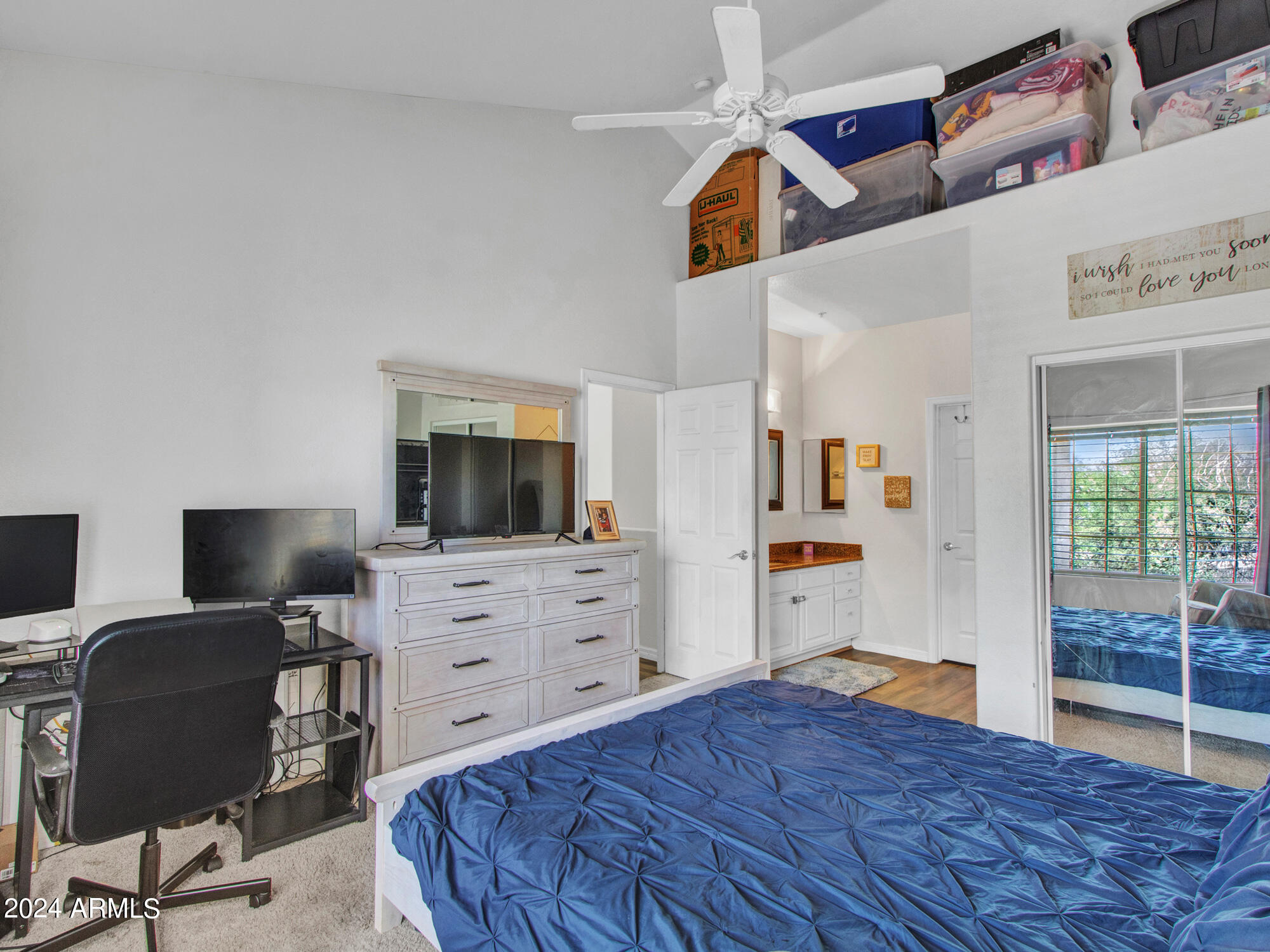 2801 North Litchfield Road, Unit 60 Goodyear, AZ 85395 - Photo 20 of 37 a bedroom with a workspace