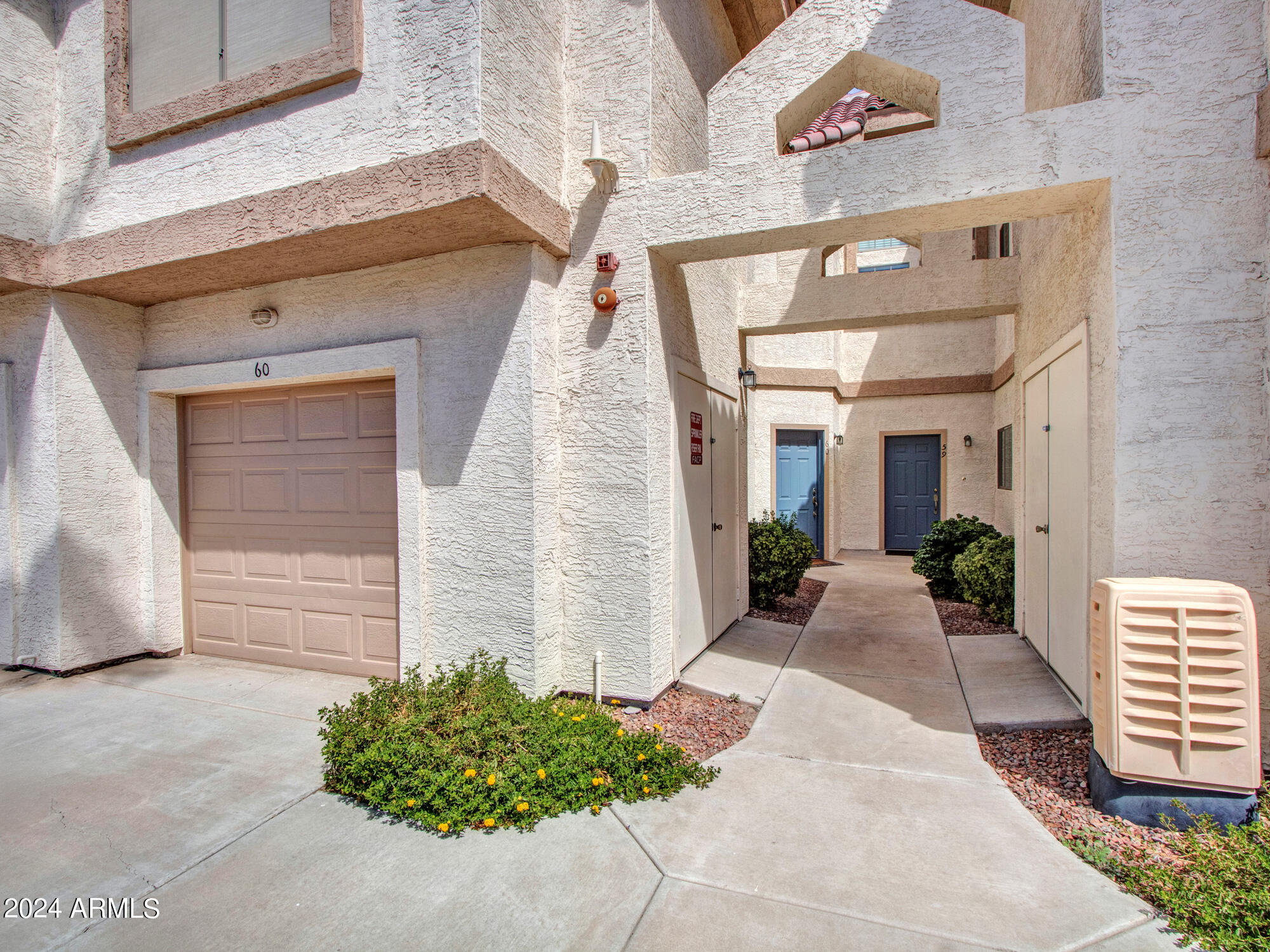 2801 North Litchfield Road, Unit 60 Goodyear, AZ 85395 - Photo 4 of 37 a view of a entryway door of the house