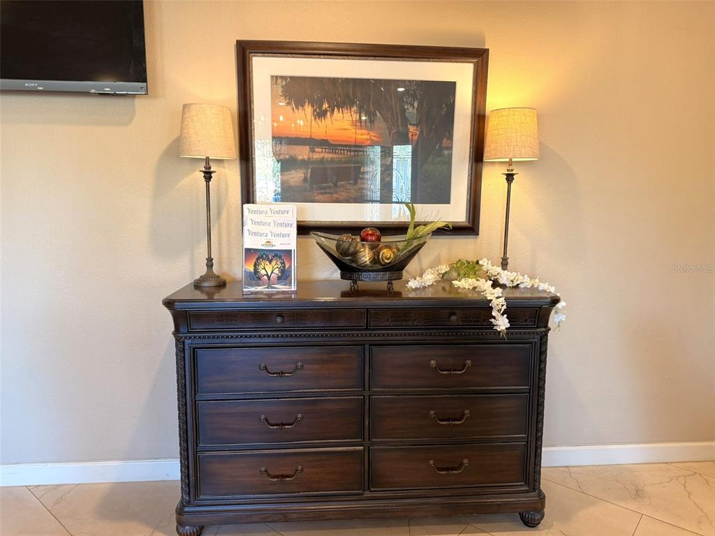 3244 Candle Ridge Drive, Unit 202 Orlando, FL 32822 - Photo 17 of 61 a view of a dresser