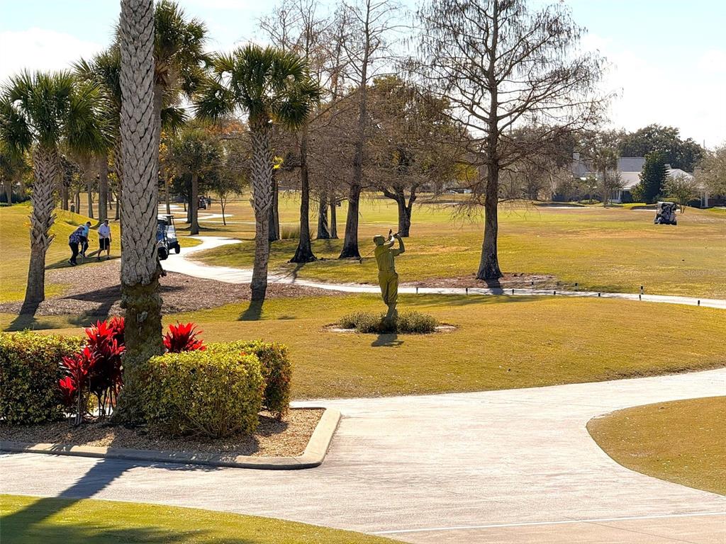 3244 Candle Ridge Drive, Unit 202 Orlando, FL 32822 - Photo 27 of 61 a swimming pool with outdoor seating and yard