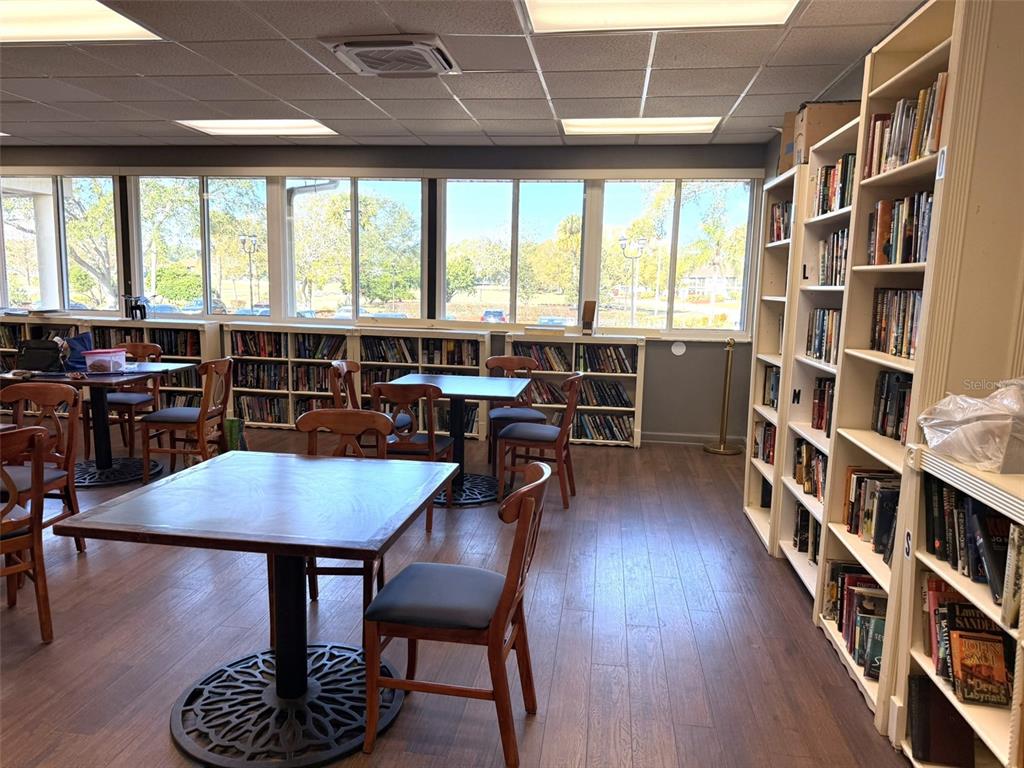 3244 Candle Ridge Drive, Unit 202 Orlando, FL 32822 - Photo 29 of 61 a view of a dining room with furniture window and wooden floor