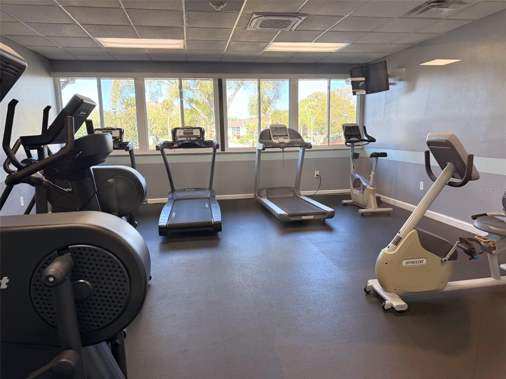 3244 Candle Ridge Drive, Unit 202 Orlando, FL 32822 - Photo 30 of 61 a view of a room with gym equipment