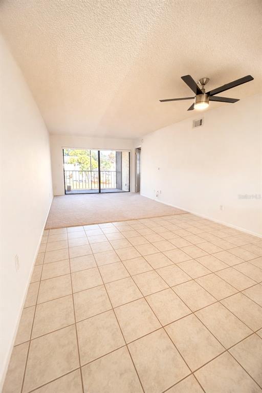 3244 Candle Ridge Drive, Unit 202 Orlando, FL 32822 - Photo 3 of 61 a view of an empty room and window