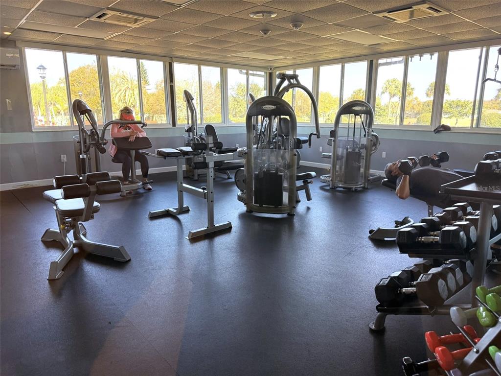 3244 Candle Ridge Drive, Unit 202 Orlando, FL 32822 - Photo 31 of 61 a view of a room with gym equipment