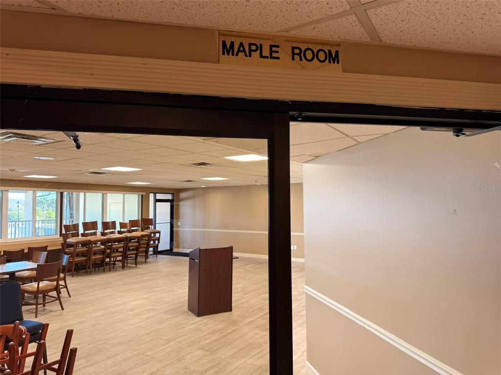 3244 Candle Ridge Drive, Unit 202 Orlando, FL 32822 - Photo 32 of 61 a lobby with furniture and a potted plant