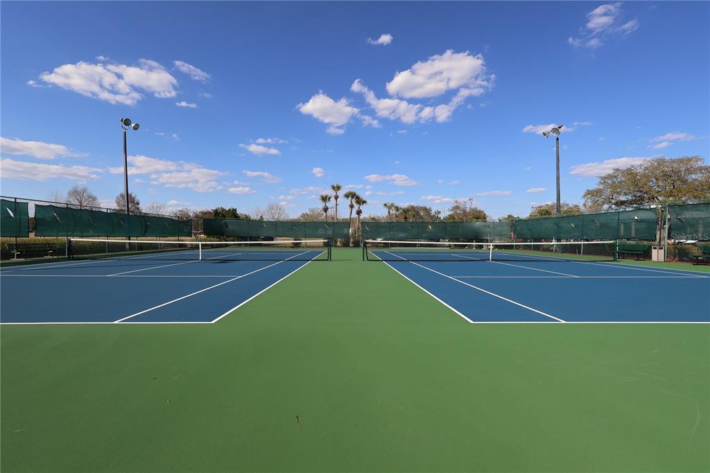 3244 Candle Ridge Drive, Unit 202 Orlando, FL 32822 - Photo 53 of 61 a view of a tennis court