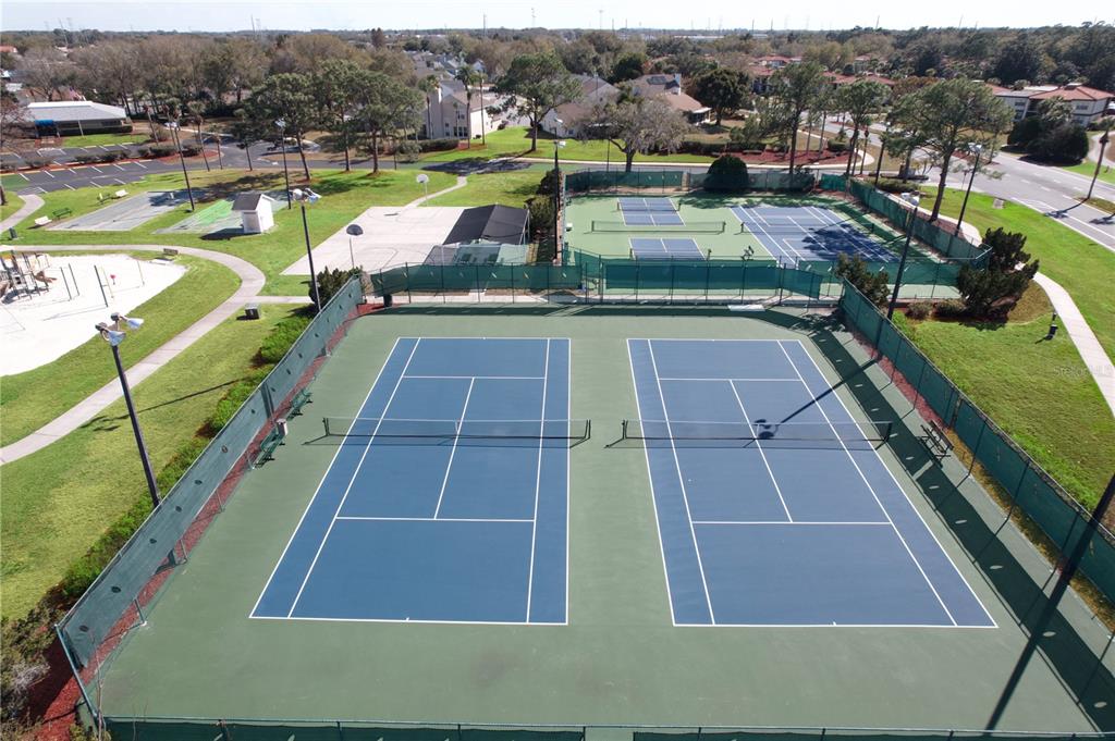 3244 Candle Ridge Drive, Unit 202 Orlando, FL 32822 - Photo 54 of 61 a view of a tennis court
