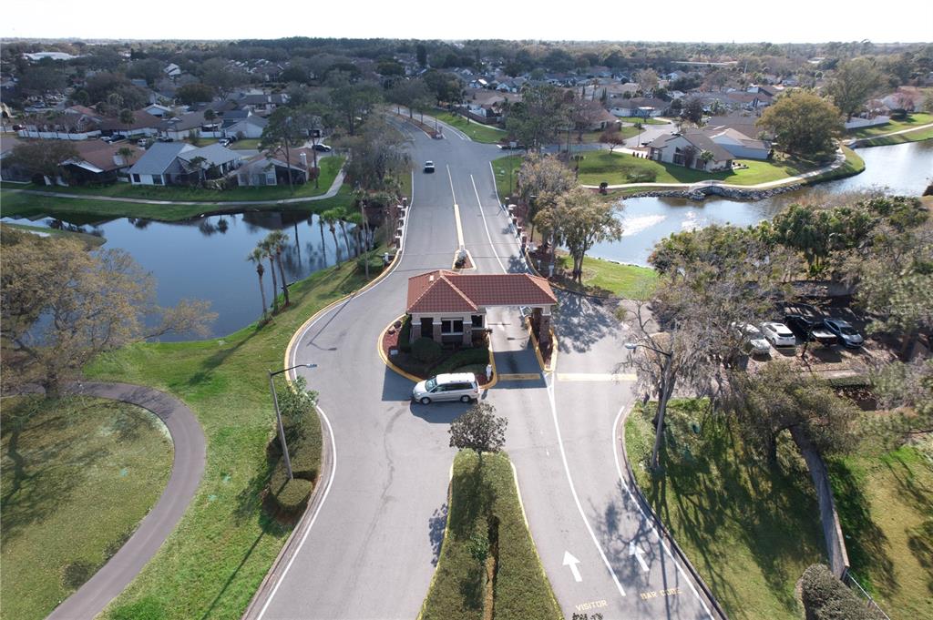 3244 Candle Ridge Drive, Unit 202 Orlando, FL 32822 - Photo 61 of 61 a view of a lake in middle of the town