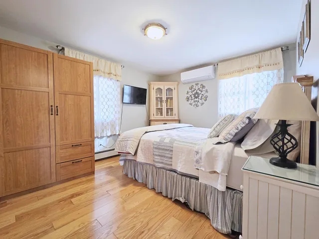 a view of a bedroom from a hallway