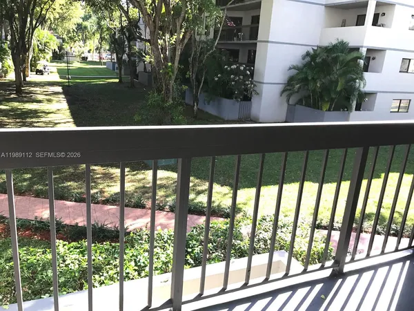 a view of swimming pool from a balcony