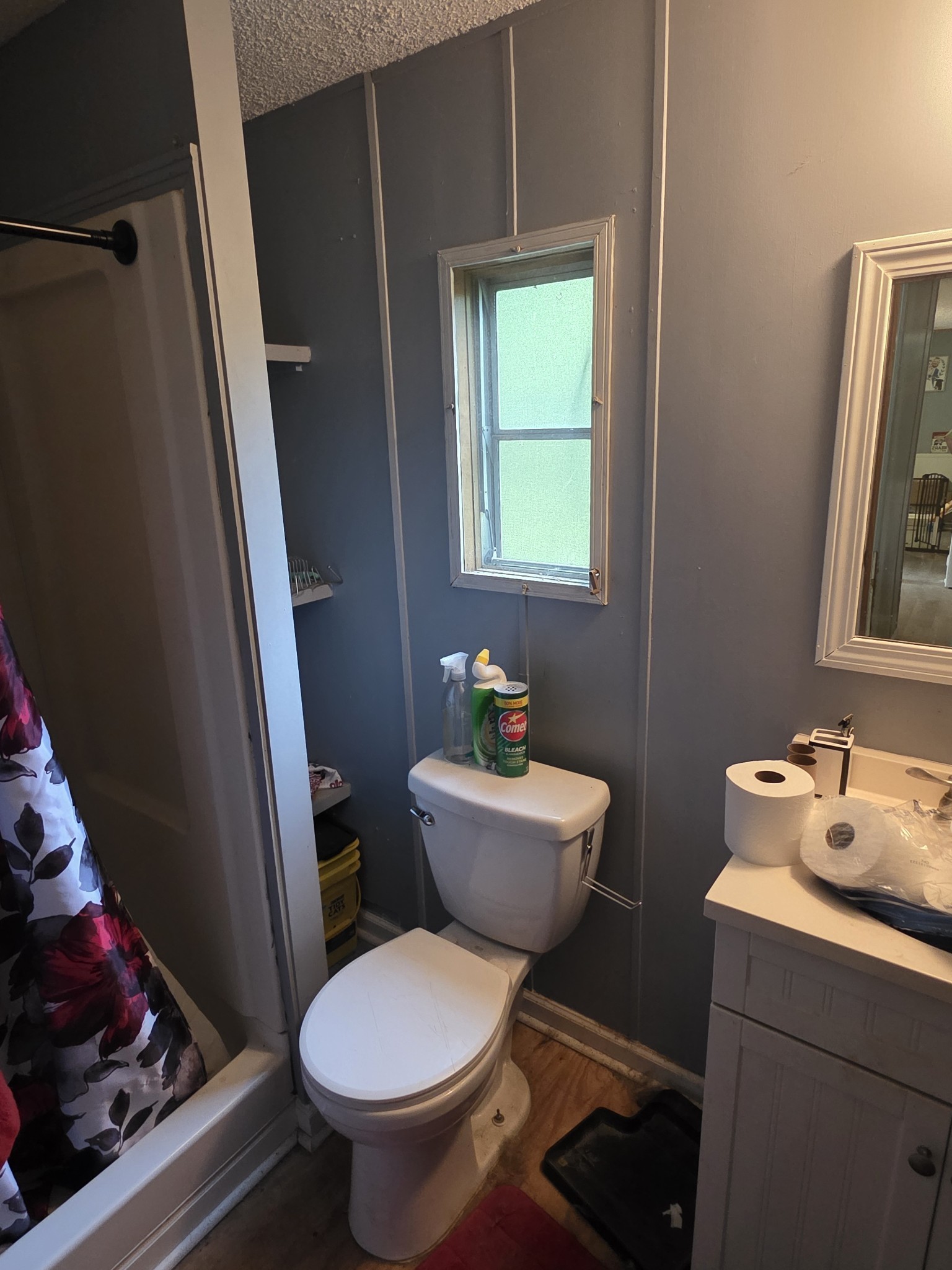 225 Opossum Hollow Road Watertown, TN 37184 - Photo 21 of 29 a white toilet sitting next to a bathroom sink