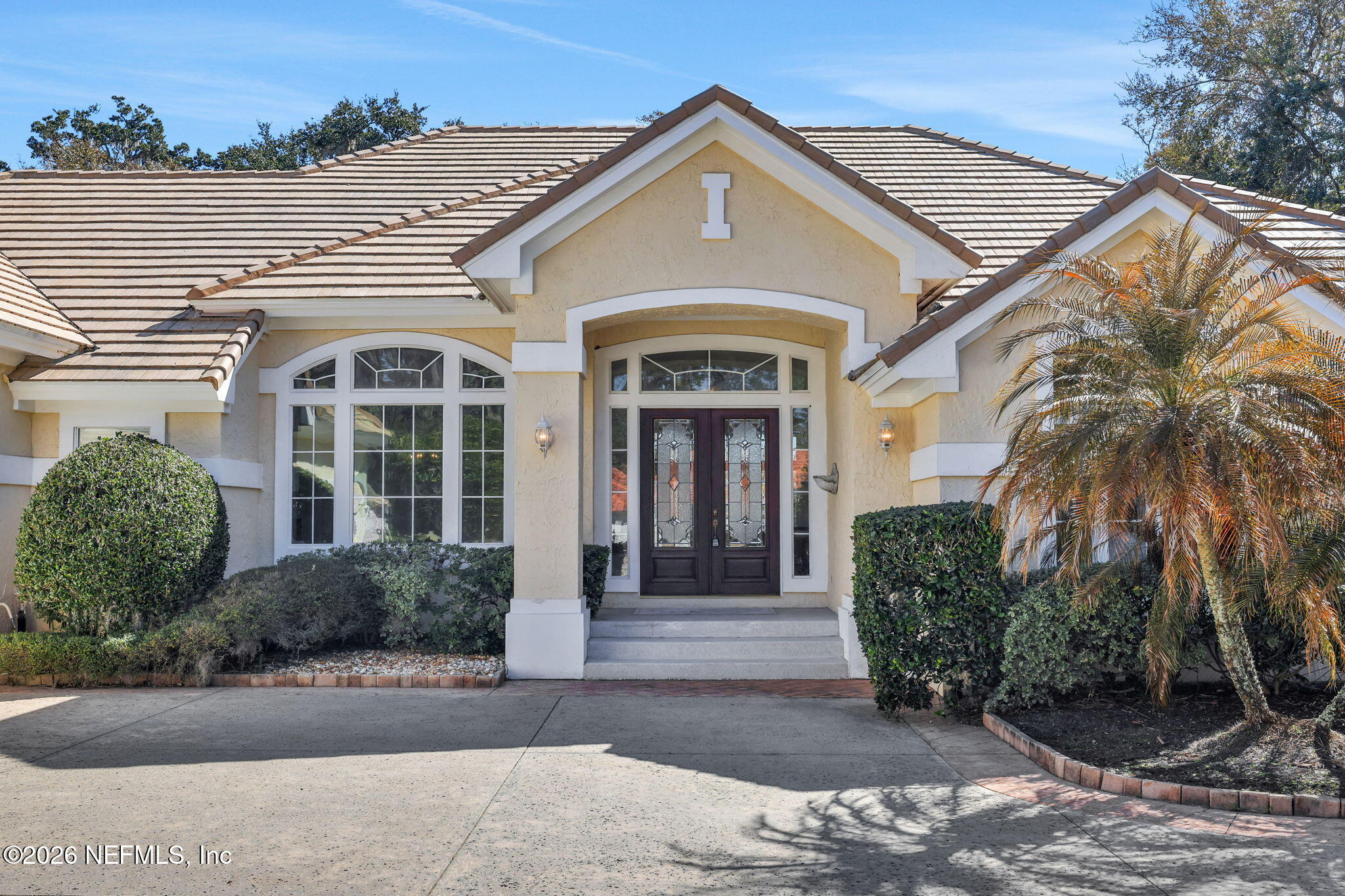 196 Governors Road Ponte Vedra Beach, FL 32082 - Photo 2 of 117 front view of a house with a yard