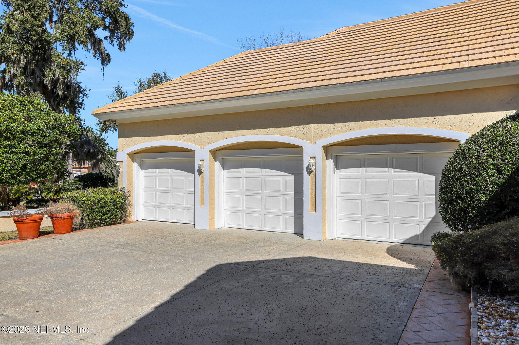 196 Governors Road Ponte Vedra Beach, FL 32082 - Photo 6 of 117 a front view of a house with garage