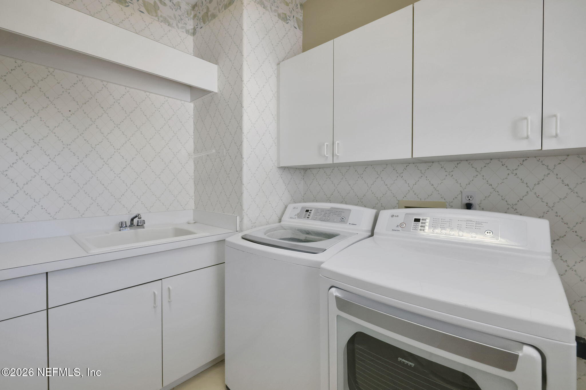 196 Governors Road Ponte Vedra Beach, FL 32082 - Photo 74 of 117 a utility room with dryer and washer