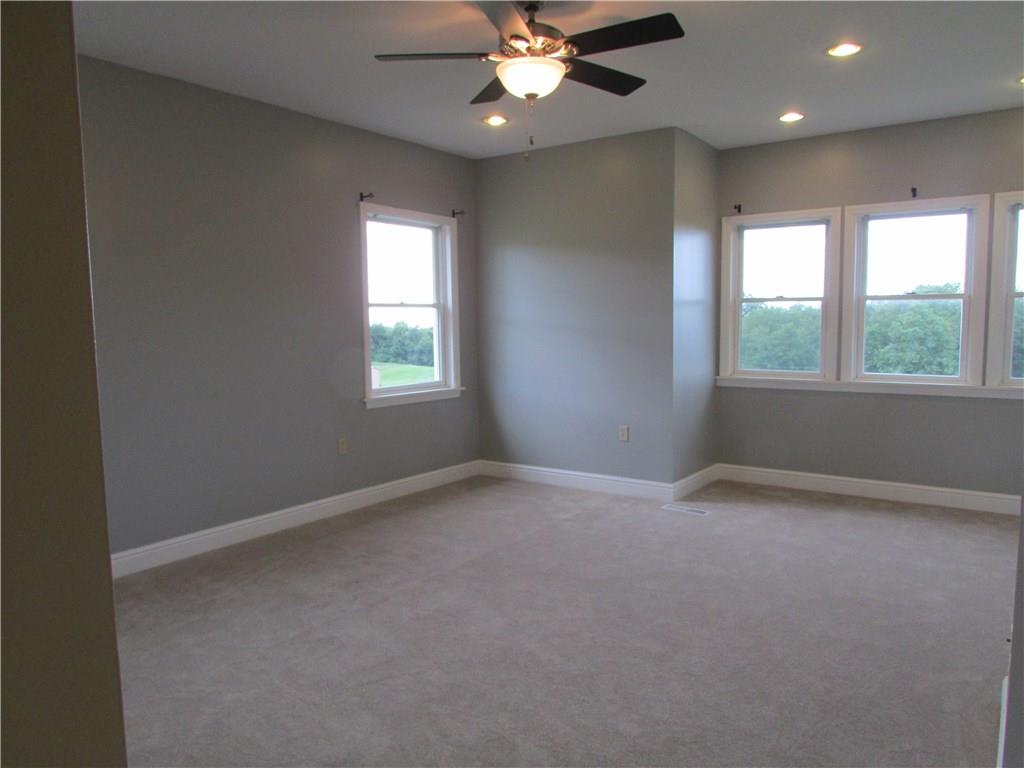 850 McCleary Road Hookstown, PA 15050 - Photo 11 of 23 Very roomy master bedroom with recessed ceiling lights and fan. Windows face the rear yard. This master bedroom features a walk in closet with organizers. Huge master bath with dual sinks, stand alone corner shower and a tub with jets.