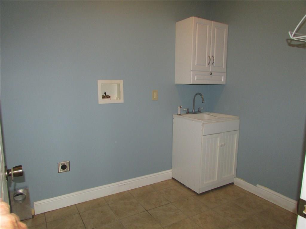 850 McCleary Road Hookstown, PA 15050 - Photo 22 of 23 Laundry with utility sink and cabinet.
