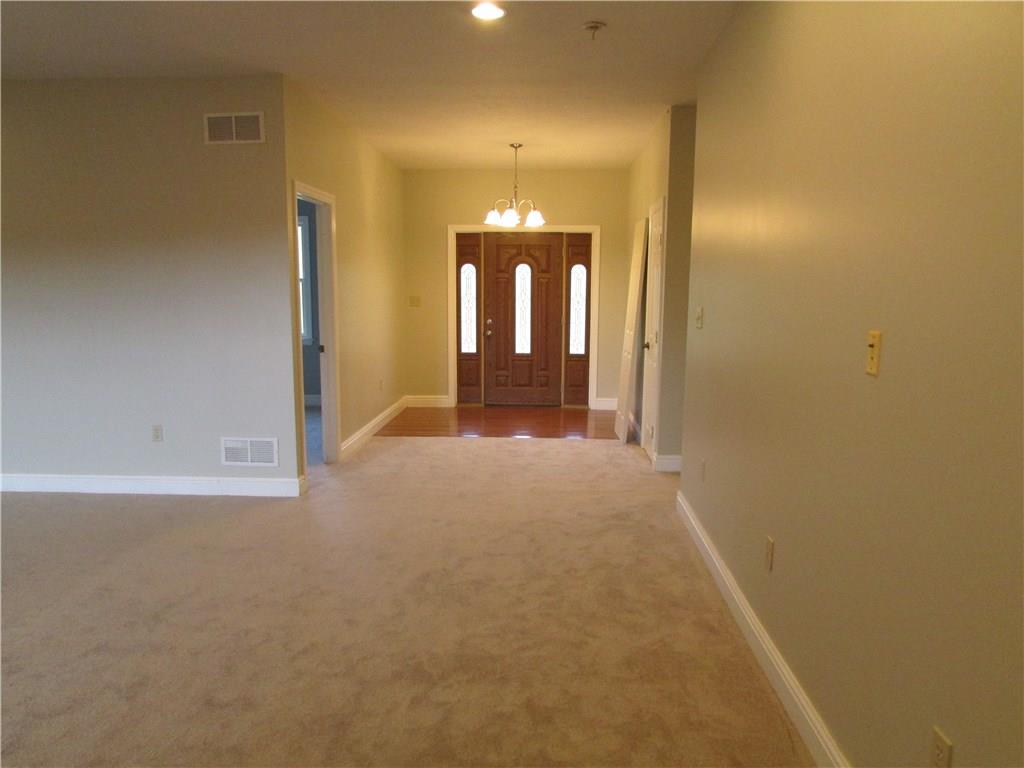 850 McCleary Road Hookstown, PA 15050 - Photo 7 of 23 Front foyer of hardwood and beautiful front doors. Coat closet on right and den on left.