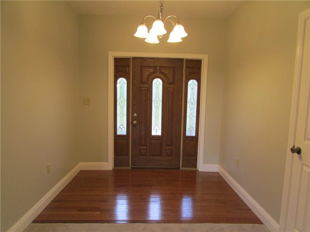 850 McCleary Road Hookstown, PA 15050 - Photo 8 of 23 Front foyer gleaming hardwood flooring and solid front door.