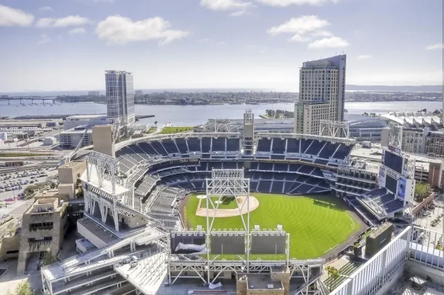 a view of a swimming pool with outdoor seating