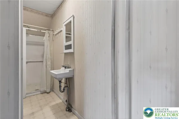 an open kitchen with a sink and dishwasher