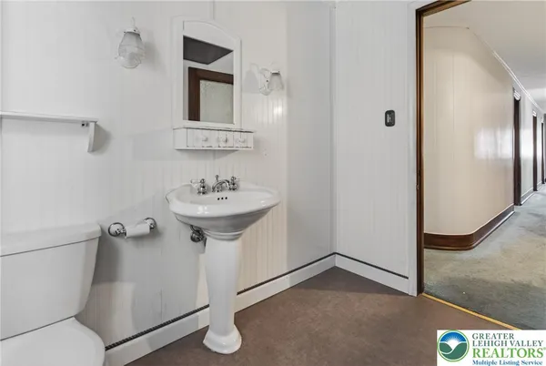 a picture of a bathroom with a shower