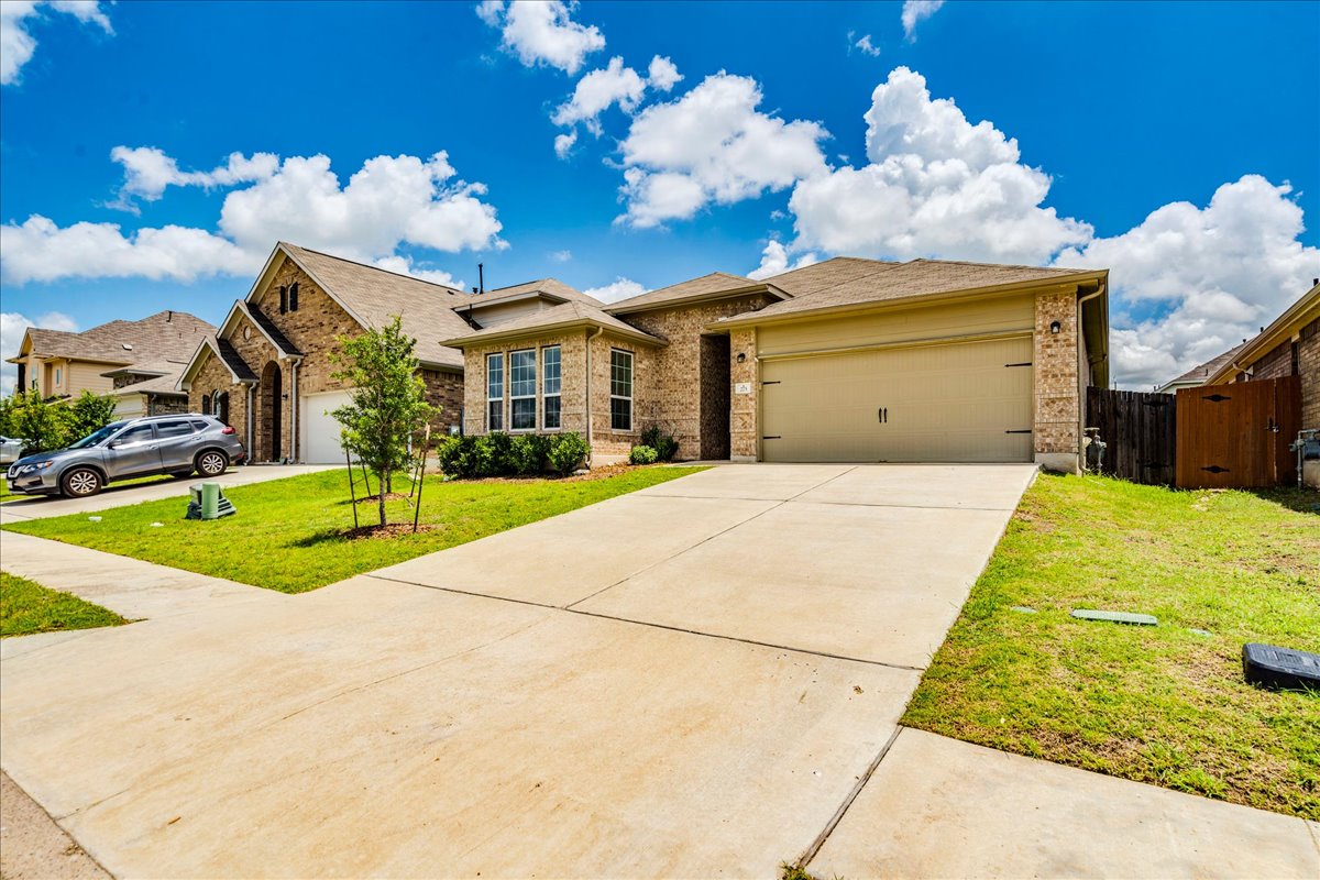 275 Cherrystone Loop Buda, TX 78610 - Photo 6 of 33 Welcome to 275 Cherrystone!