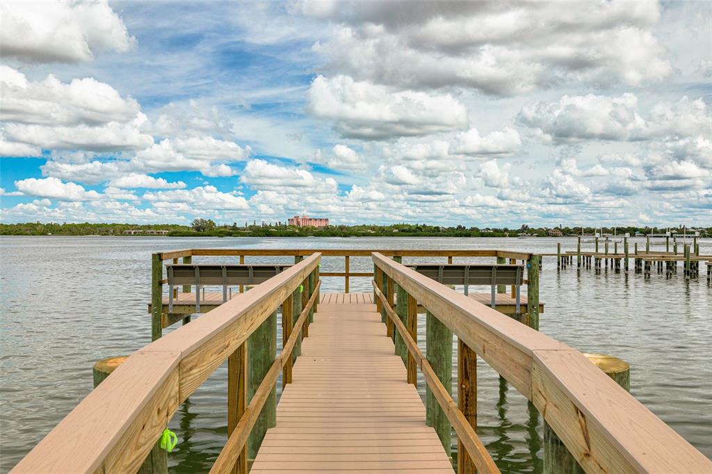 8701 Midnight Pass Road, Unit 106A Sarasota, FL 34242 - Photo 45 of 54 a view of outdoor space and lake