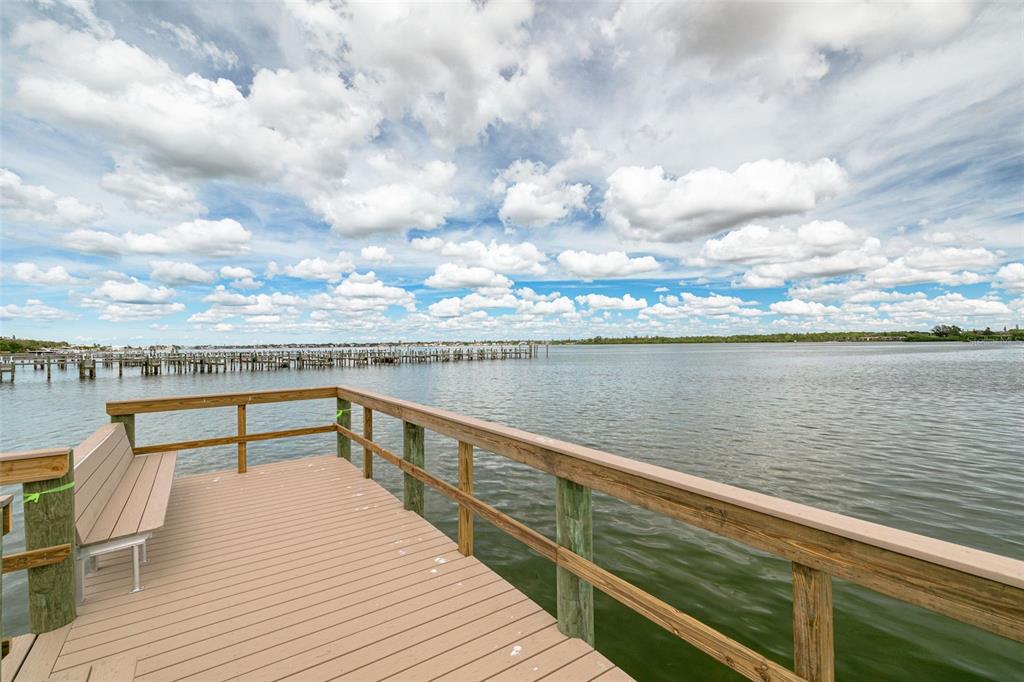 8701 Midnight Pass Road, Unit 106A Sarasota, FL 34242 - Photo 46 of 54 a view of outdoor space and lake