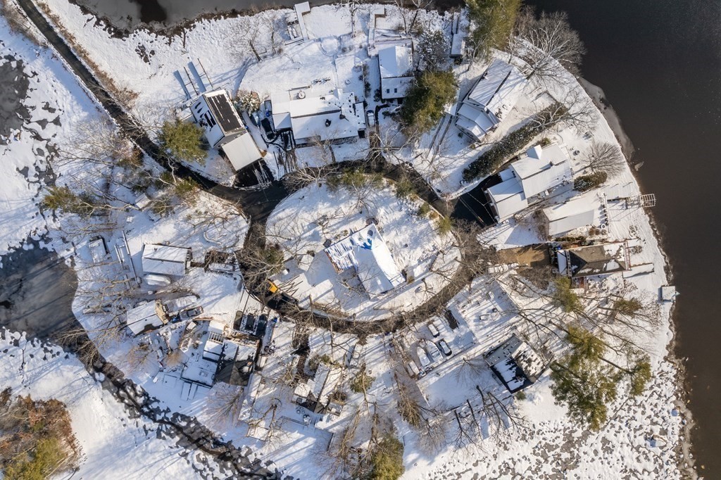 49 Woody Island Road Hopkinton, MA 01748 - Photo 16 of 33 a bird of lots of sitting on a table