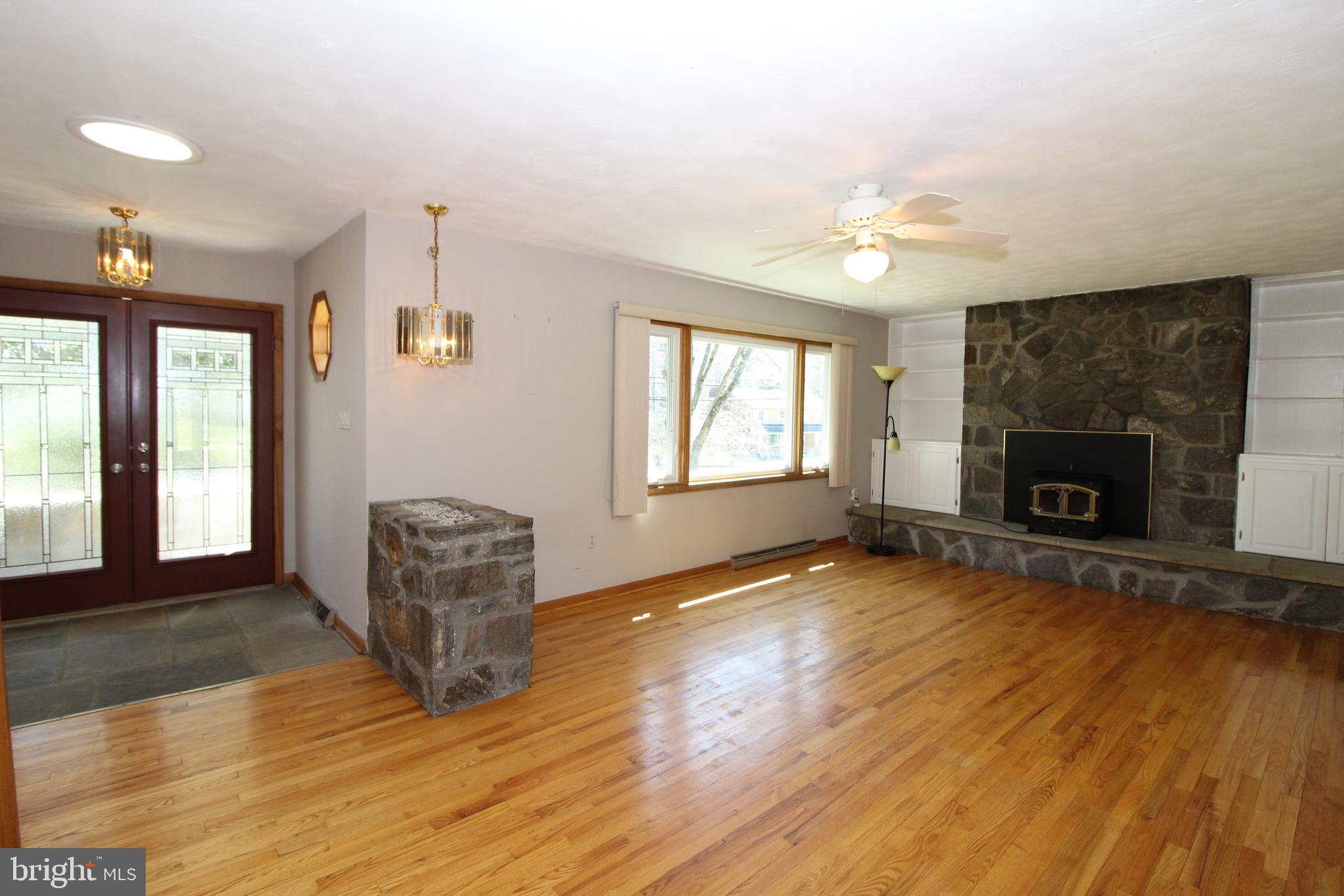 2711 Ebright Road Wilmington, DE 19810 - Photo 10 of 35 Large Living Room with Stone Fireplace