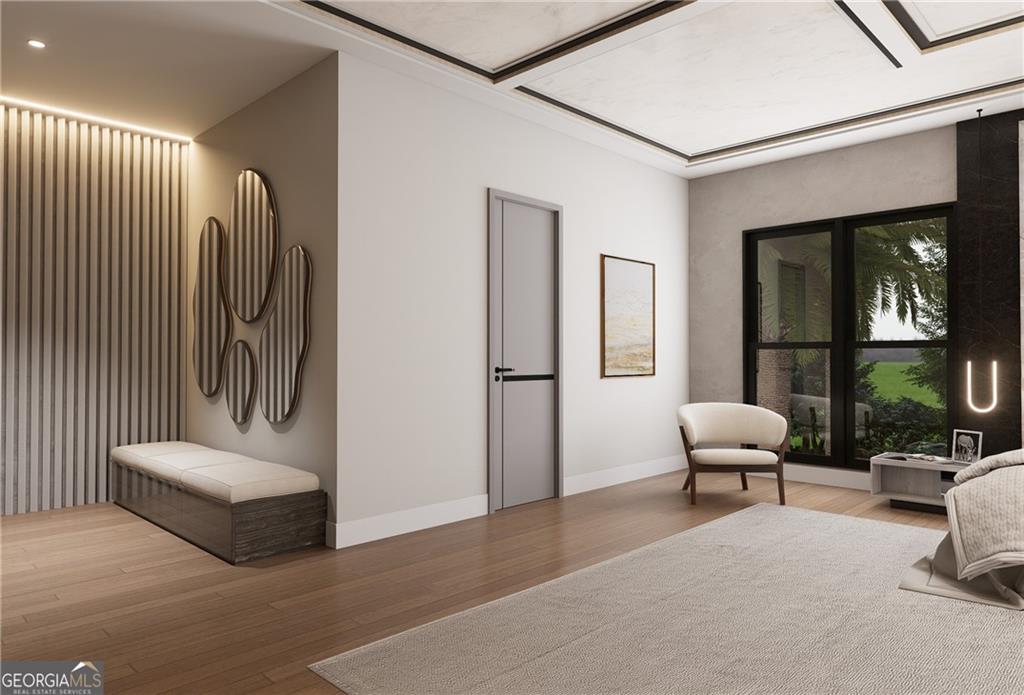 591 Decoupage Drive Fairburn, GA 30213 - Photo 13 of 34 a living room with furniture and a potted plant