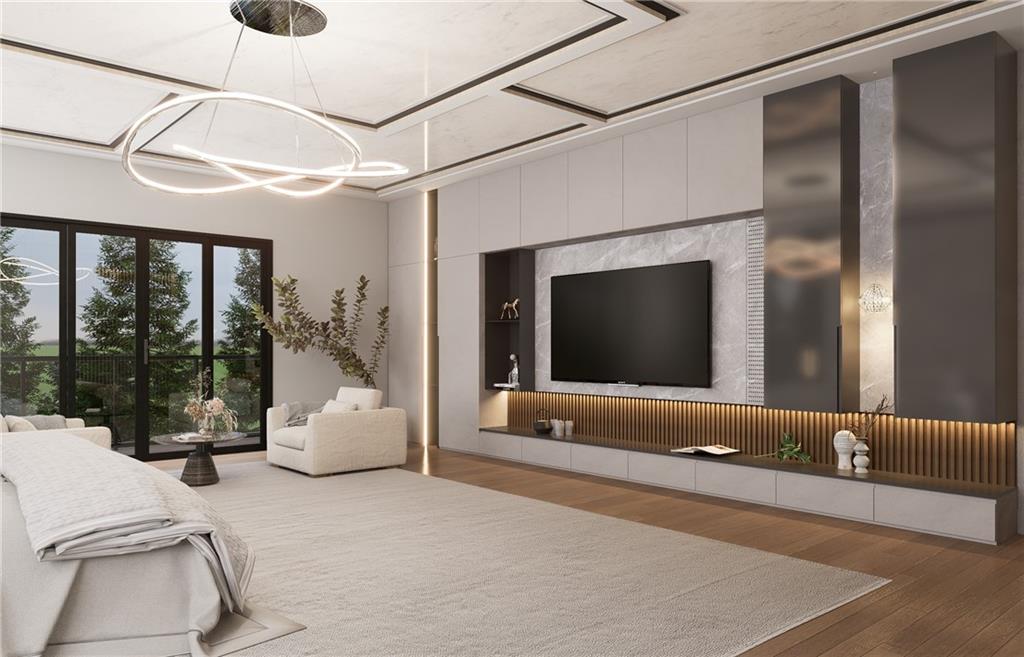 591 Decoupage Drive Fairburn, GA 30213 - Photo 16 of 34 a living room with furniture and a flat screen tv