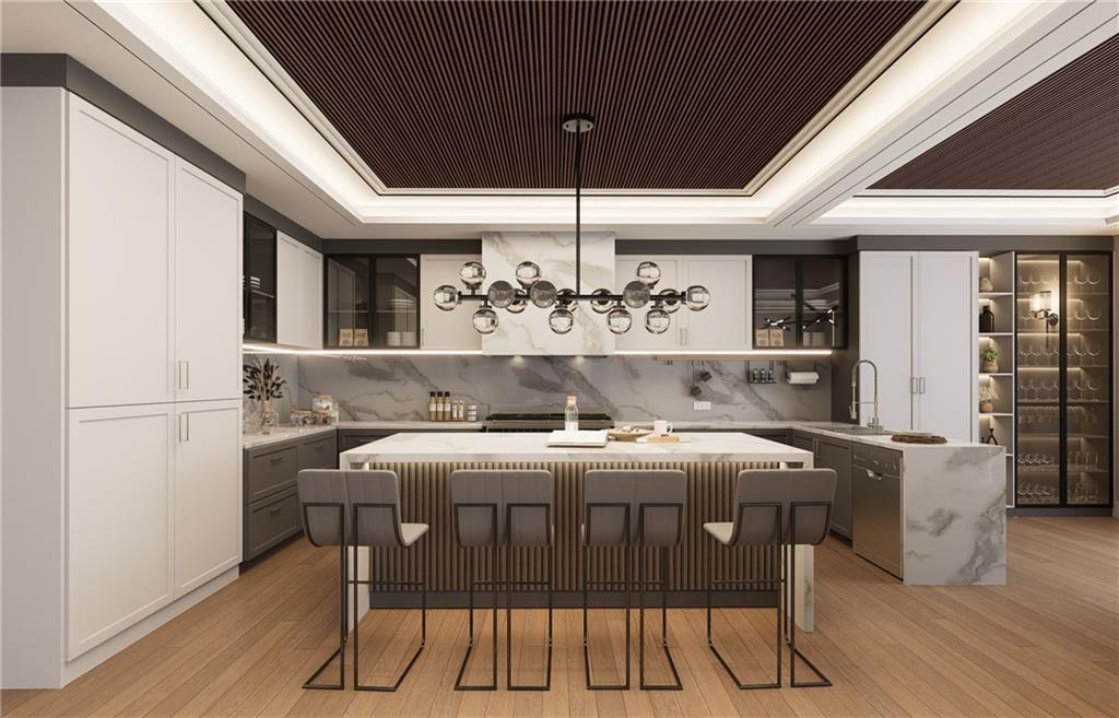 591 Decoupage Drive Fairburn, GA 30213 - Photo 18 of 34 a kitchen with a table chairs and wooden floor