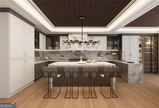 a view of a dining room with furniture wooden floor and chandelier