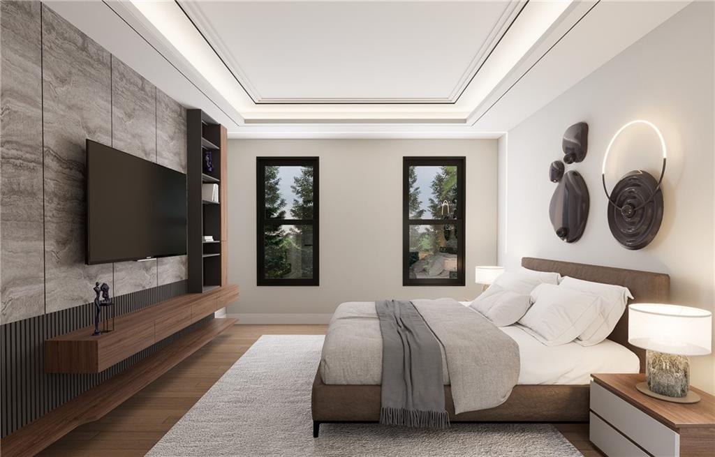 591 Decoupage Drive Fairburn, GA 30213 - Photo 19 of 34 a spacious bedroom with a bed and a flat screen tv