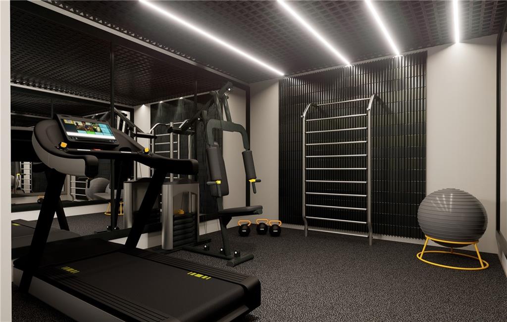 591 Decoupage Drive Fairburn, GA 30213 - Photo 20 of 34 a room with gym equipment and a large window