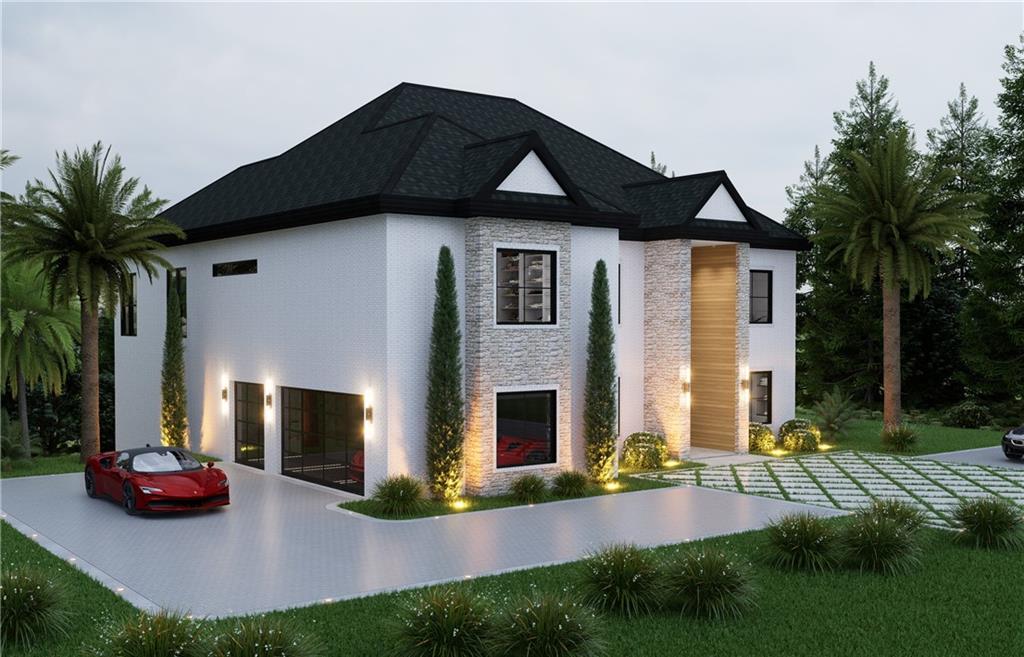 591 Decoupage Drive Fairburn, GA 30213 - Photo 2 of 34 a front view of a house with yard and garage