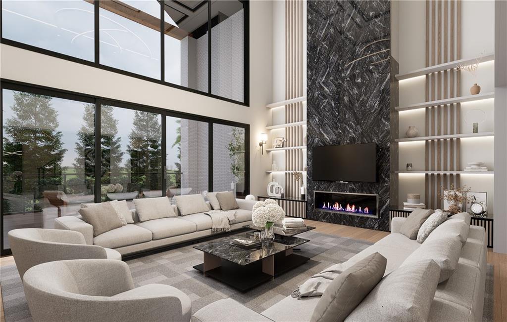 591 Decoupage Drive Fairburn, GA 30213 - Photo 22 of 34 a living room with furniture and a floor to ceiling window