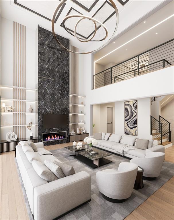 591 Decoupage Drive Fairburn, GA 30213 - Photo 23 of 34 a living room with furniture and a fireplace