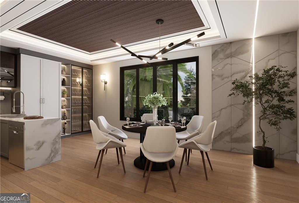 591 Decoupage Drive Fairburn, GA 30213 - Photo 27 of 34 a dining room with furniture and wooden floor