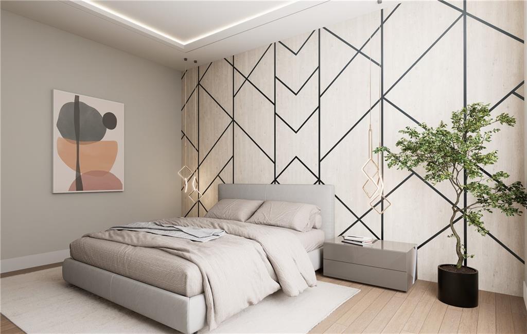 591 Decoupage Drive Fairburn, GA 30213 - Photo 30 of 34 a bedroom with a bed and a potted plant